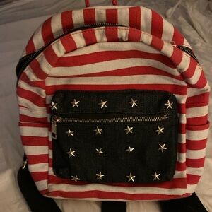 Red and White Striped Backpack with Star Accents. Great for summer Patriots!